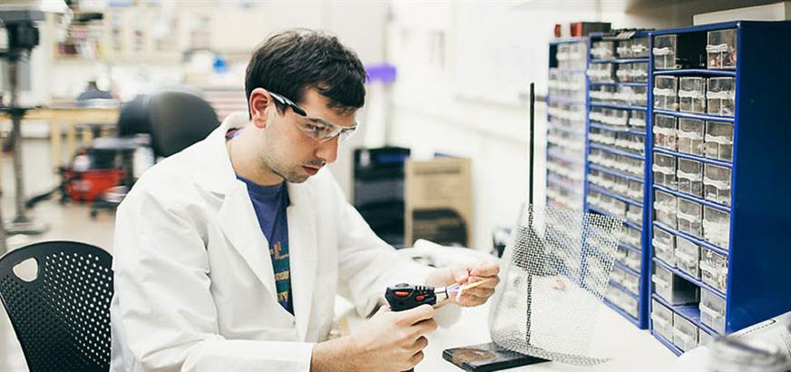 A Chemistry student working on an experiment