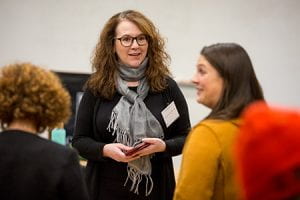 people chatting at the lavoie lecture