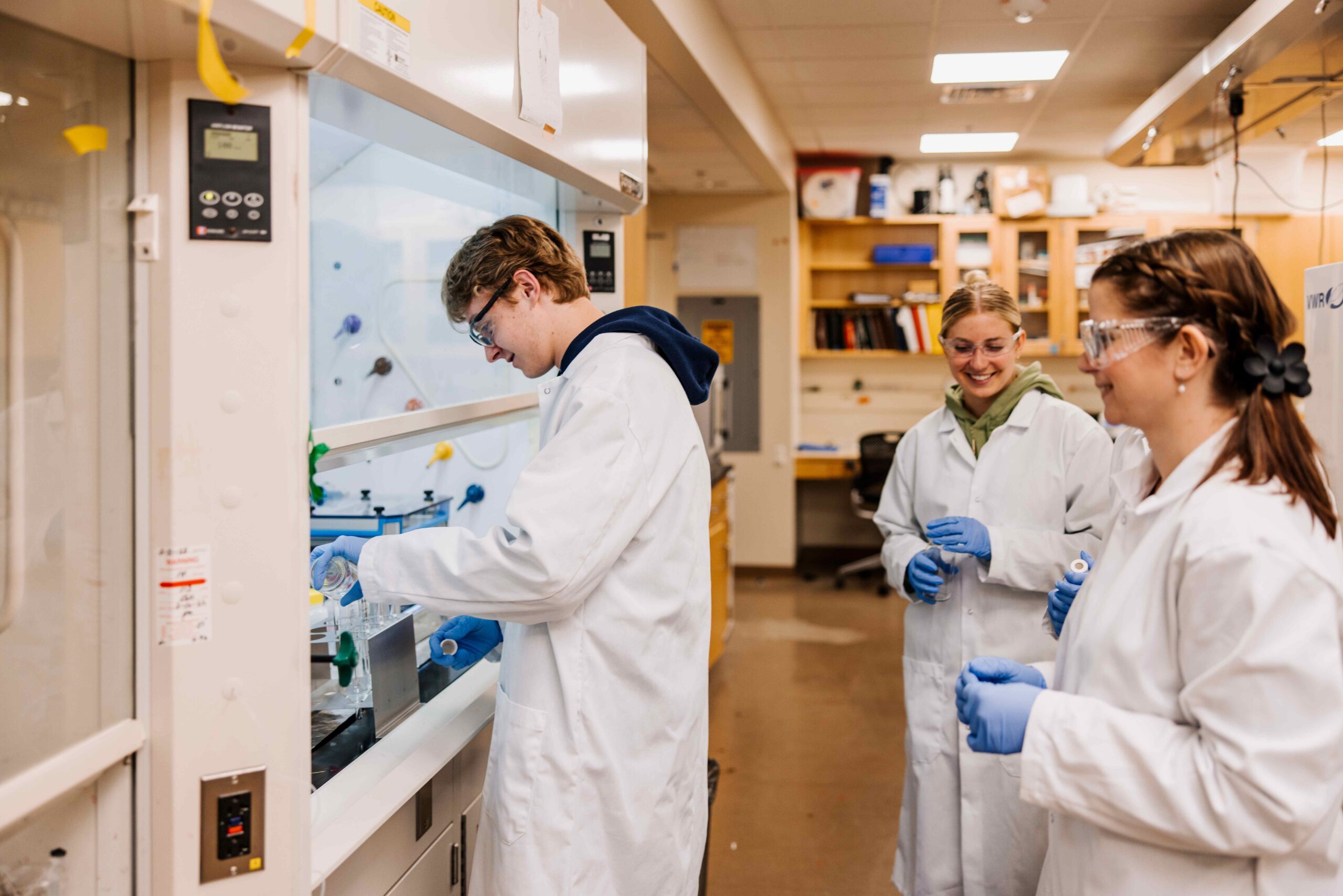 Dr. Addie Clark in lab with students